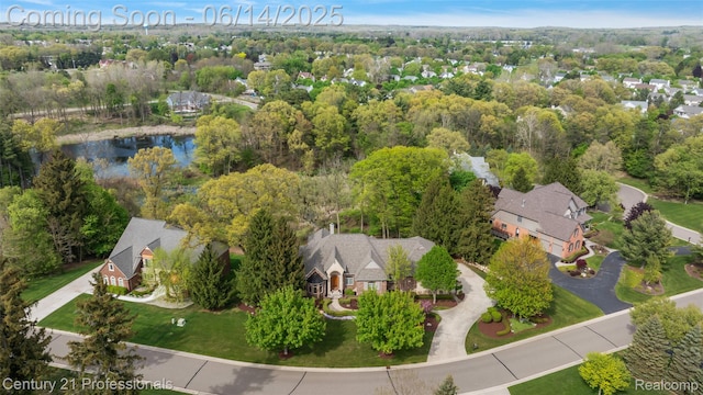 1181 Iroquois Trl, Oxford, MI 48371 - aerial perspective of suburban area with a large body of water