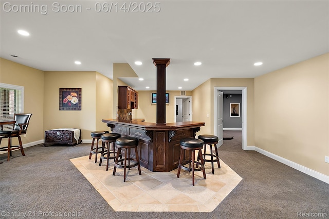 1181 Iroquois Trl, Oxford, MI 48371 - indoor dry bar with light carpet, recessed lighting, and ornate columns