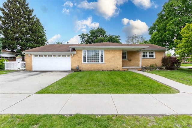 25547 Jennifer St, Redford, MI 48239 - single story home with a garage, concrete driveway, and brick siding