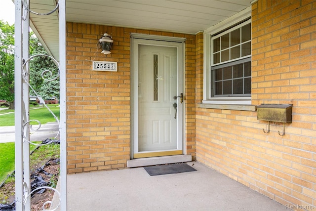 25547 Jennifer St, Redford, MI 48239 - property entrance featuring brick siding and covered porch
