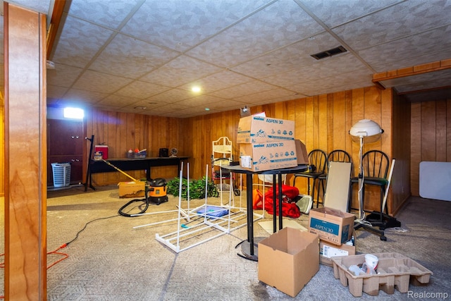 25547 Jennifer St, Redford, MI 48239 - playroom with carpet floors, wooden walls, and a paneled ceiling