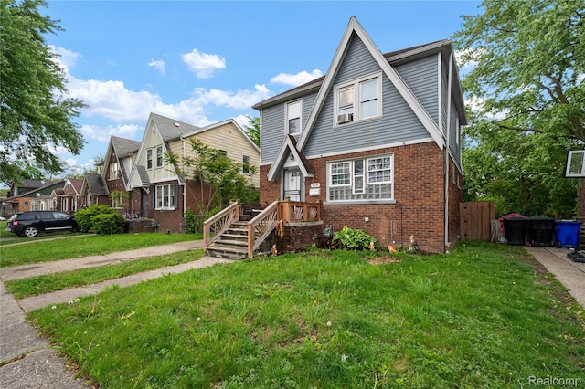 12518 Corbett St, Hamtramck, MI 48213 - view of front of home with brick siding and a residential view