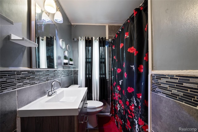 12518 Corbett St, Hamtramck, MI 48213 - bathroom featuring toilet, vanity, tile walls, and a shower with shower curtain