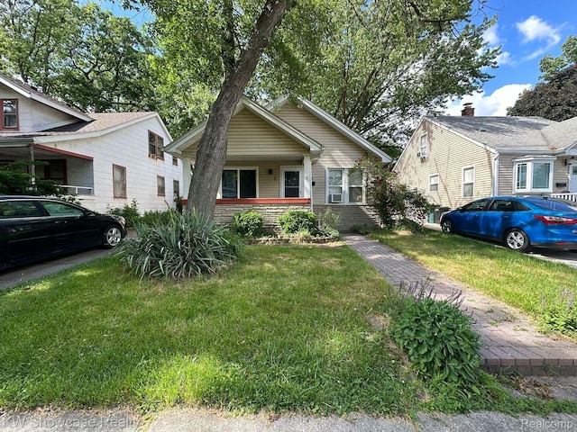 459 E Breckenridge St, Ferndale, MI 48220 - bungalow-style house featuring a front lawn and a porch