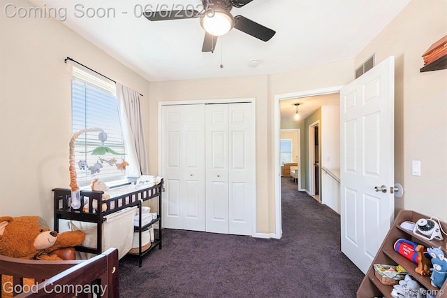 22571 E 13 Mile Rd, Saint Clair Shores, MI 48082 - bedroom featuring dark colored carpet, a closet, and a ceiling fan