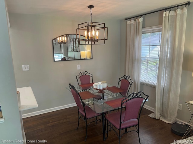 1525 Ackley Ave, Westland, MI 48186 - dining area featuring wood finished floors, baseboards, and a chandelier