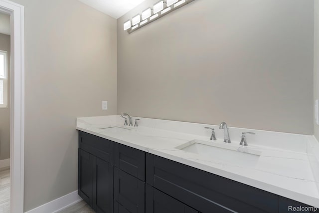 1439 Merry Rd, Waterford, MI 48328 - full bath featuring double vanity and baseboards