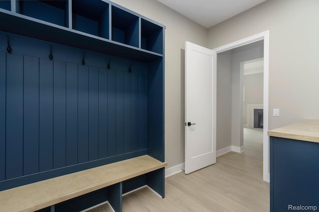 1439 Merry Rd, Waterford, MI 48328 - mudroom featuring light wood-type flooring and baseboards