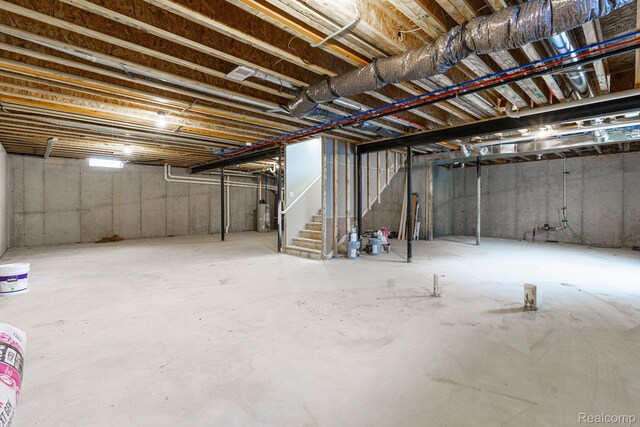 1439 Merry Rd, Waterford, MI 48328 - unfinished below grade area with gas water heater and stairs