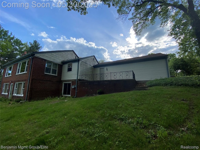 30430 Inkster Rd, Franklin, MI 48025 - rear view of property featuring a yard and brick siding