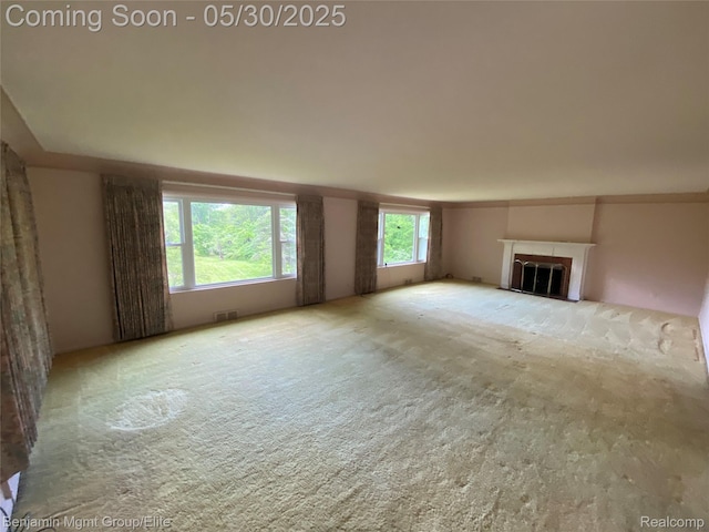 30430 Inkster Rd, Franklin, MI 48025 - unfurnished living room featuring carpet and a fireplace