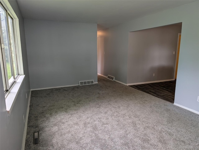 190 Main St, Sebewaing, MI 48759 - carpeted empty room featuring baseboards