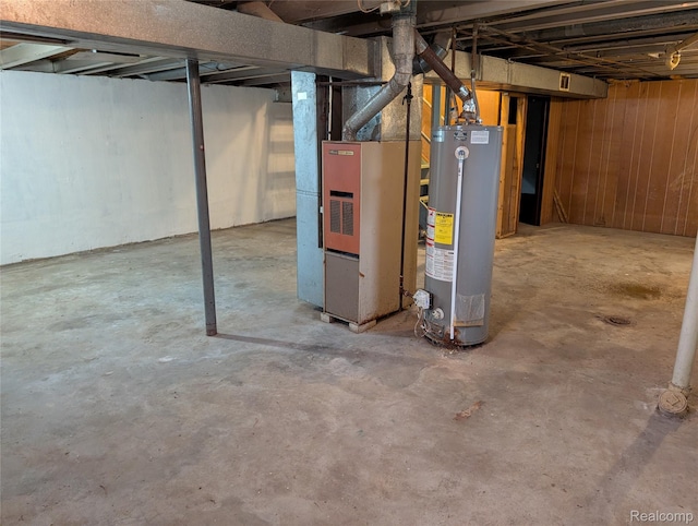 190 Main St, Sebewaing, MI 48759 - unfinished below grade area with gas water heater and heating unit