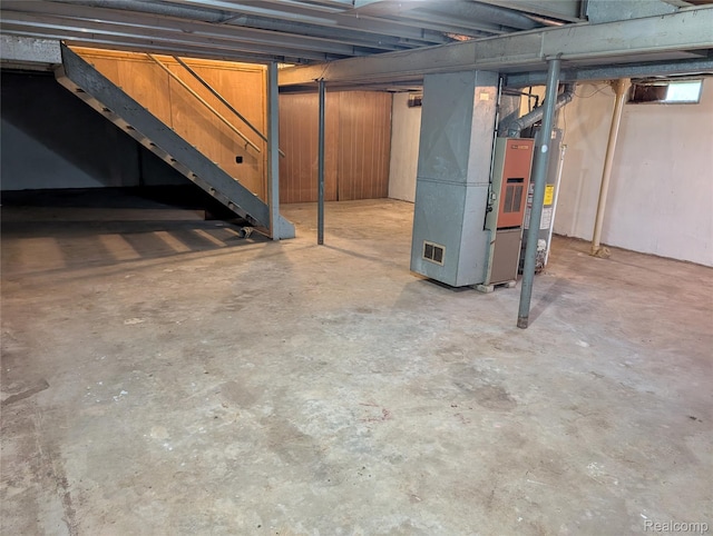 190 Main St, Sebewaing, MI 48759 - unfinished below grade area featuring heating unit and water heater