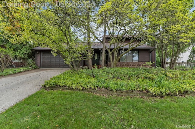 5772 Perrytown Dr, West Bloomfield, MI 48322 - view of front of property with brick siding, concrete driveway, and a garage