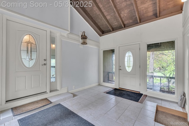 5772 Perrytown Dr, West Bloomfield, MI 48322 - tiled entrance foyer with wooden ceiling with exposed beams and high vaulted ceiling