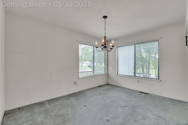 5772 Perrytown Dr, West Bloomfield, MI 48322 - spare room featuring a chandelier, carpet, and baseboards
