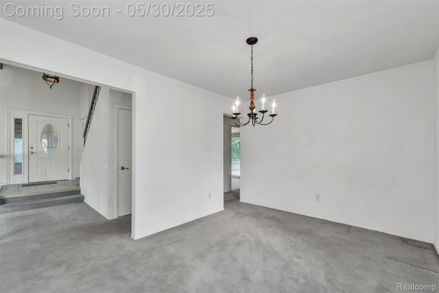 5772 Perrytown Dr, West Bloomfield, MI 48322 - carpeted spare room featuring a chandelier