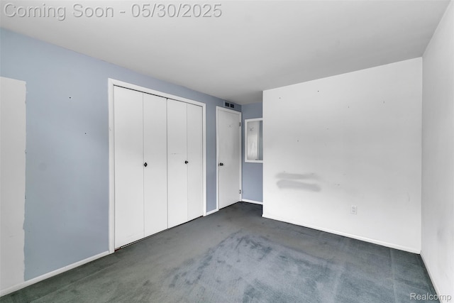 5772 Perrytown Dr, West Bloomfield, MI 48322 - unfurnished bedroom with carpet, baseboards, and a closet
