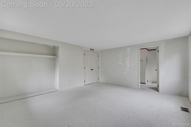 5772 Perrytown Dr, West Bloomfield, MI 48322 - unfurnished bedroom featuring carpet and multiple closets