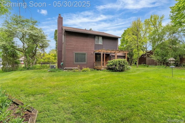 5772 Perrytown Dr, West Bloomfield, MI 48322 - rear view of house with a chimney, central AC unit, and a pergola
