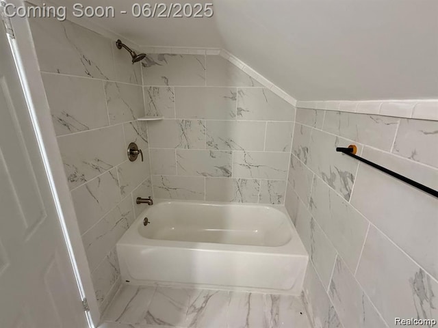 8419 Paige, Warren, MI 48089 - bathroom featuring  shower combination, tile walls, and marble look tiles