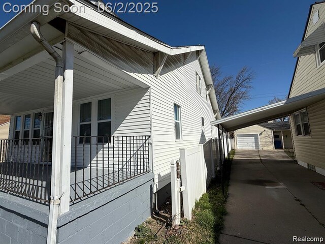 8419 Paige, Warren, MI 48089 - view of side of home with an outdoor structure and driveway
