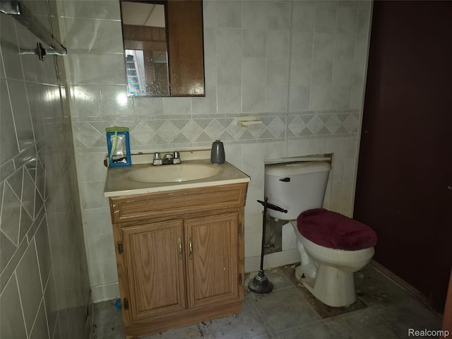 30102 Matthew St, Redford, MI 48186 - bathroom featuring vanity, toilet, and tile walls