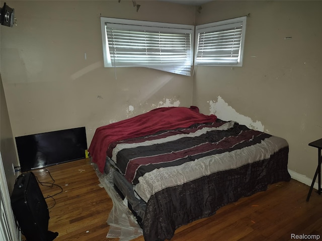 30102 Matthew St, Redford, MI 48186 - bedroom featuring wood finished floors and multiple windows