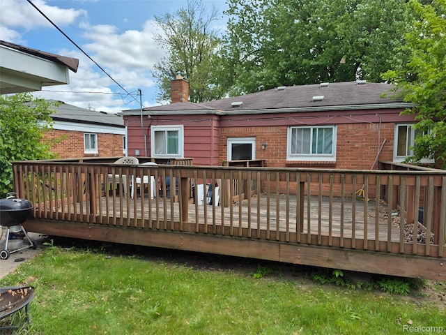 30102 Matthew St, Redford, MI 48186 - rear view of house with a chimney, a wooden deck, and brick siding