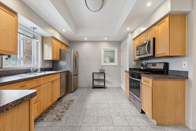 3364 Inman St, Ferndale, MI 48220 - kitchen featuring stainless steel appliances, a sink, dark countertops, recessed lighting, and a raised ceiling