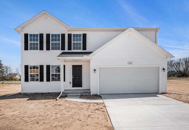 521 Snow Pine Ct NE, Cedar Springs, MI 49319 - view of front of house with concrete driveway and an attached garage
