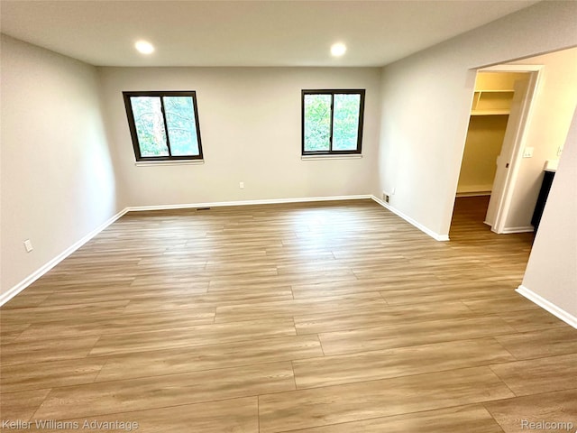 31404 Hunters Circle Dr, Farmington, MI 48334 - unfurnished room with recessed lighting, light wood-type flooring, and baseboards