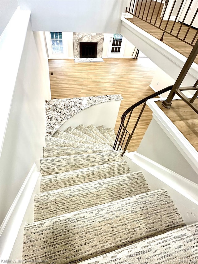 31404 Hunters Circle Dr, Farmington, MI 48334 - stairs featuring wood finished floors and baseboards
