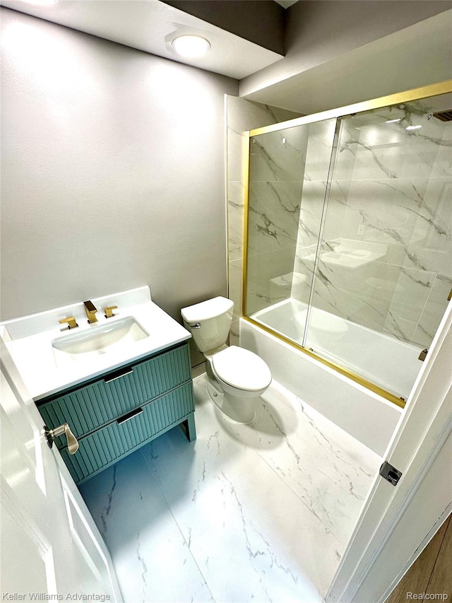 31404 Hunters Circle Dr, Farmington, MI 48334 - full bath with toilet, vanity, marble look tile flooring, and shower / bath combination with glass door