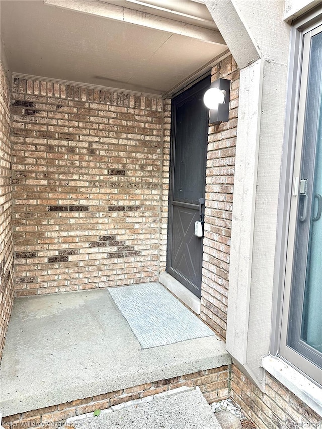 31404 Hunters Circle Dr, Farmington, MI 48334 - doorway to property featuring brick siding