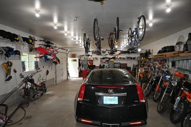 5830 Oneil St, Twin Lake, MI 49457 - garage with a workshop area