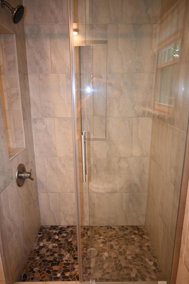 5830 Oneil St, Twin Lake, MI 49457 - full bathroom featuring a shower stall