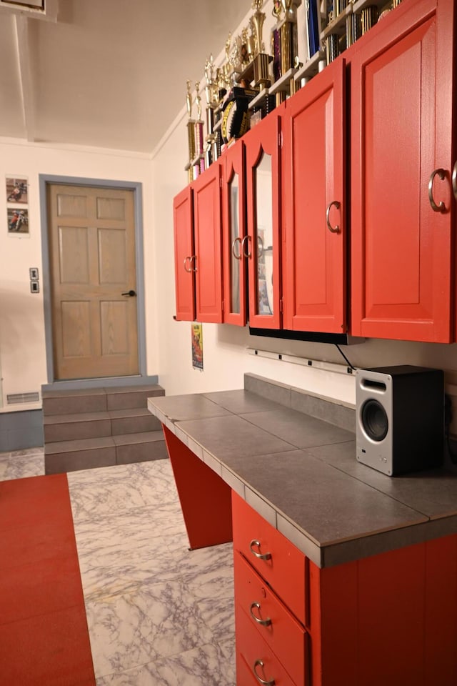 5830 Oneil St, Twin Lake, MI 49457 - kitchen with dark countertops and marble finish floors