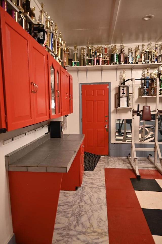 5830 Oneil St, Twin Lake, MI 49457 - kitchen featuring tile counters and an office area