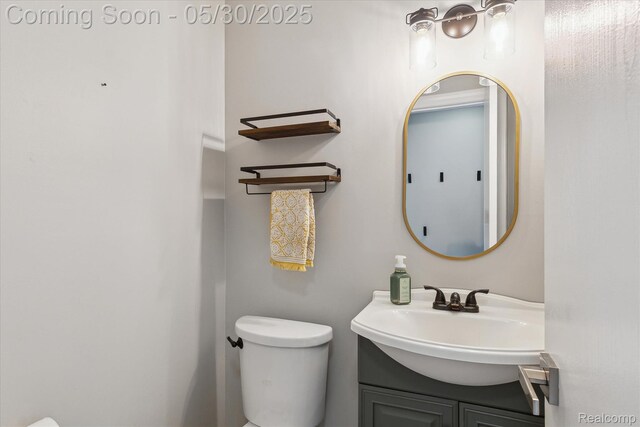 45127 Fair Oaks Dr, Canton, MI 48187 - bathroom featuring toilet and vanity