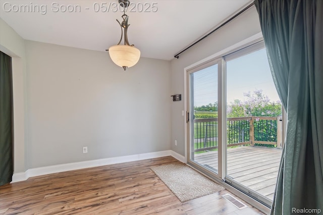 45127 Fair Oaks Dr, Canton, MI 48187 - spare room featuring wood finished floors and baseboards