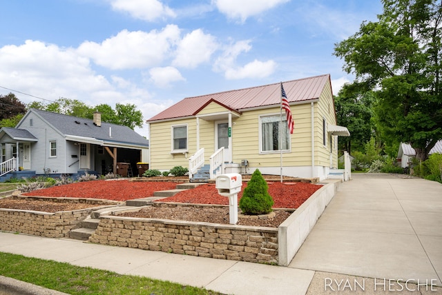812 Forest St, Ionia, MI 48846 - bungalow-style home with metal roof