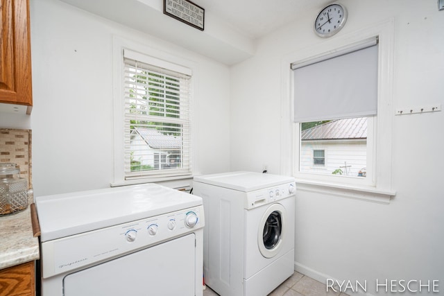 812 Forest St, Ionia, MI 48846 - washroom with washer and clothes dryer, light tile patterned floors, and baseboards