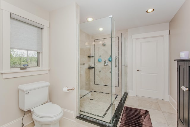 2210 Lindsey Rd, Jackson, MI 49201 - bathroom with toilet, baseboards, a shower stall, tile patterned floors, and recessed lighting
