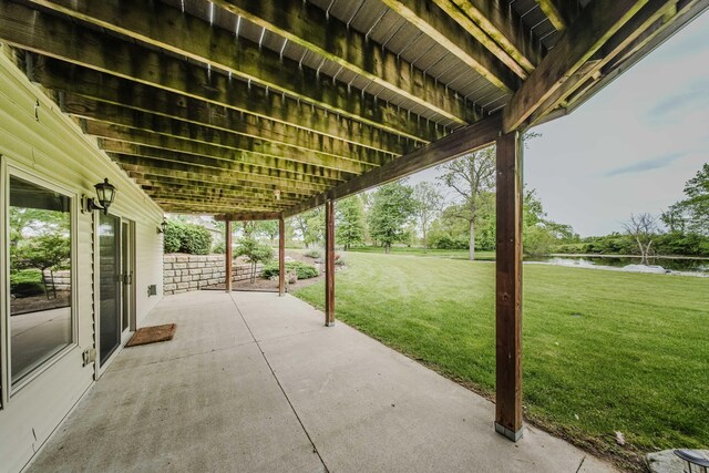 2210 Lindsey Rd, Jackson, MI 49201 - view of patio / terrace featuring a water view