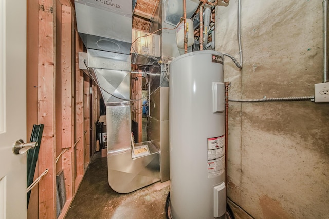 2210 Lindsey Rd, Jackson, MI 49201 - utility room featuring water heater