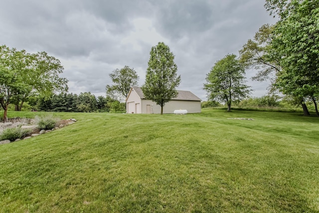 2210 Lindsey Rd, Jackson, MI 49201 - view of grassy yard with an outbuilding