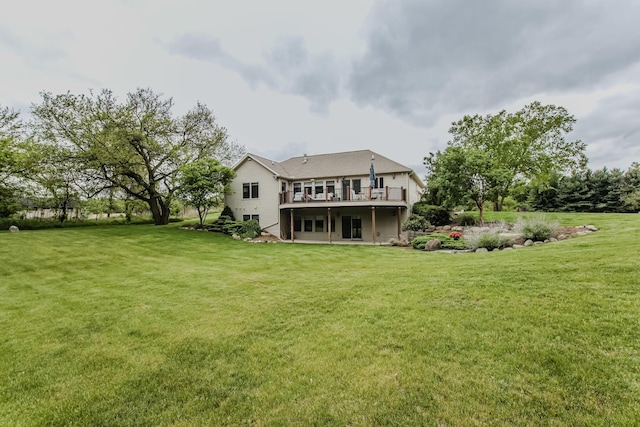 2210 Lindsey Rd, Jackson, MI 49201 - rear view of property featuring a wooden deck and a lawn