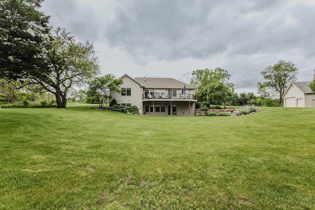 2210 Lindsey Rd, Jackson, MI 49201 - view of green lawn featuring a deck and a detached garage